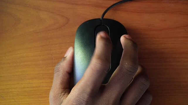 computer mouse moving and scrolling showing the intense playing of a game