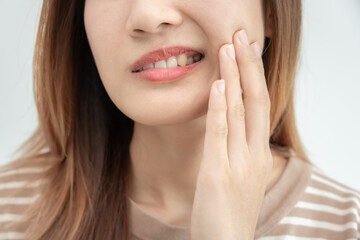Asian woman feel toothache from gingivitis, female suffer tooth, decay problems, dental care....