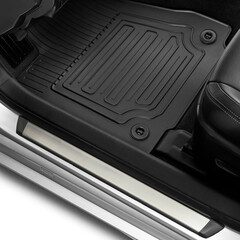 Luxury car floor mats in black plastic