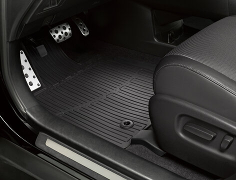 Luxury car floor mats in black plastic