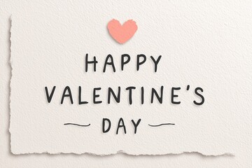 Happy Valentine's Day greeting. Handwritten text and pink paper heart on white textured paper background