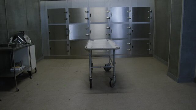 A corpse on a gurney in a hospital morgue