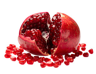 Ripe pomegranate split open with glossy red arils and scattered seeds, fresh juicy fruit food concept on isolated background
