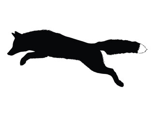 A striking silhouette of a fox captured mid leap full of energy