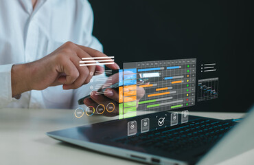 Digital project management and data analytics concept with smartphone and laptop, showing timeline planning, performance tracking dashboard, business workflow optimization, and productivity analysis.