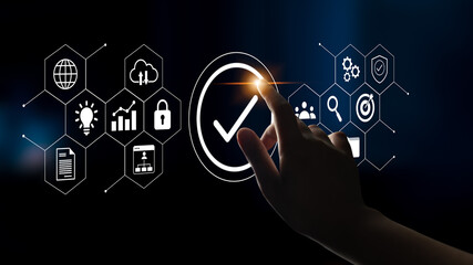 A dynamic digital scene where a hand interacts with a glowing checkmark amidst various icons, symbolizing technology, security, and innovation in a modern context. Gantry