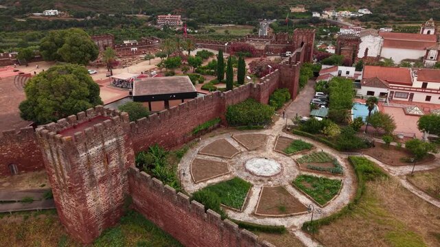 Exploring the historic silves castle grounds and gardens in algarve portugal on a summer day