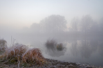 morning mist over the river with frost