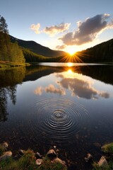 Serene Sunset Reflection Over Calm Lake with Ripples in Water