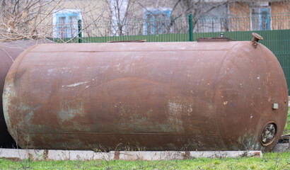 rusty metal large tank