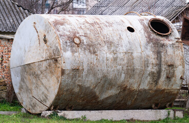 rusty metal large tank