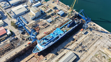 Fototapeta premium Aerial drone photo of famous Skaramangas Shipyards, an emblematic infrastructure in gulf of Elefsina, West Attica, Greece