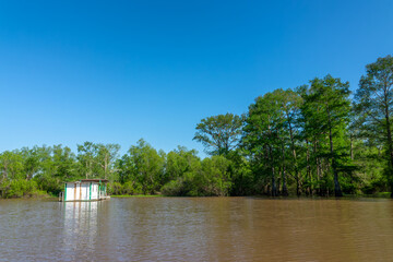 Floating fishing hut in Atchafalaya basin, South Louisiana