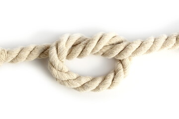 A twisting rope lies on a white background.	