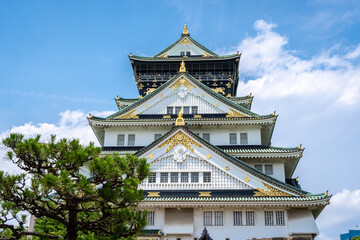 Main tower of Osaka Castle in Japan on sunny day