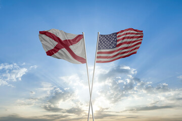 Flags of Alabama state and United states of America together waving in sky