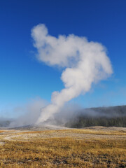 Tall Steam Column from Geyser Eruption in Yellowstone