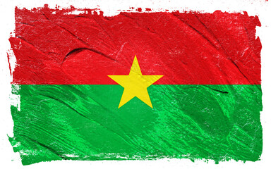 Distressed artistic rendition of a national flag, featuring red, green, and yellow colors with a textured, grunge visual style on a black background.