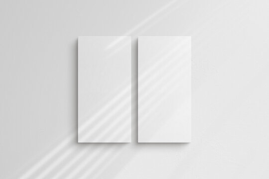 Canvas mockup 1:2. Set of two canvases. Gallery wall mockup, set of 2 canvases. Clean, modern, minimalist, bright. Portrait. Vertical. Shadow overlay.