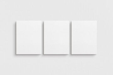 Canvas mockup 3:4. Set of three canvases. Gallery wall mockup, set of 3 canvases. Clean, modern, minimalist, bright. Portrait. Vertical.