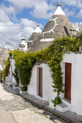 View of traditional trulli houses in Alberobello, Puglia, Italy, Bari region.