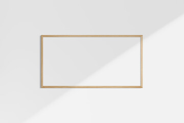 Horizontal frame mockup 2:1, 1:2 landscape. Single oak wood frame mockup. Clean, modern, minimalist, bright. Shadow overlay.