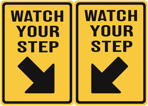 Two signs indicating watch where you step or watch you r step.