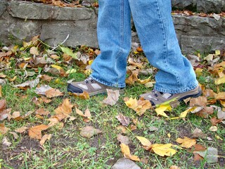 walking in autumn park hiking boots