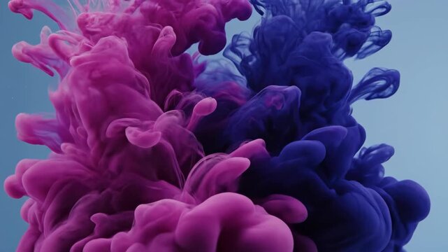 Swirling magenta and blue ink plumes mingle in water