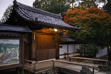 Traditional Japanese Pagoda Temple With Curved Roofs and Ornate Wooden Detailing in Dark Architecture