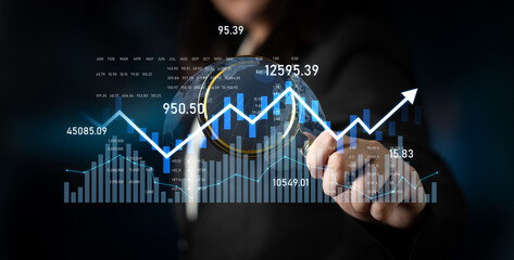 A business professional analyzes financial data using modern digital tools, highlighting growth trends and market projections in a dynamic office setting. Scalp