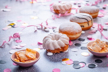 Colorful donuts, berliner and pastries for party and carnival