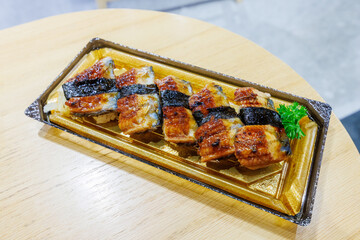 Takeaway sushi box on a table