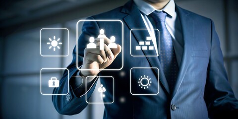 Businessman in blue suit interacting with digital on white background white digital interface hand interaction