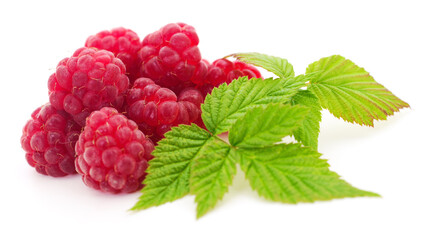 Group of fresh ripe red raspberries with green leaf isolated on white