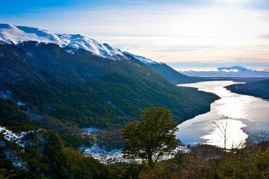 Patagonia Argentina with snow mountain and lake at sunset - Powered by Adobe