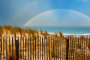 Rainbow Appears Over the Ocean at Soulac-sur-Mer in France