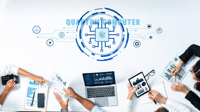 Professionals collaborate on a quantum computing project, utilizing modern devices for data analysis while surrounded by visuals, showcasing innovation and teamwork. Trope - Powered by Adobe