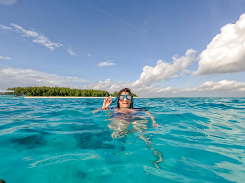 Snorkeling adventure in crystal waters of Zanzibar - Powered by Adobe