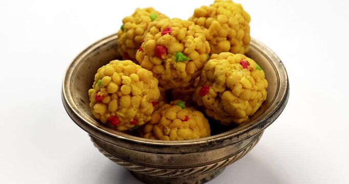 indian sweet motichoor laddoo&nbsp;or Bundi laddu made of gram flour very small balls or boondis which are deep fried and soaked in sugar syrup before making balls