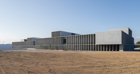 Brutalist concrete building on university campus