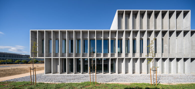 Brutalist concrete building on a university campus