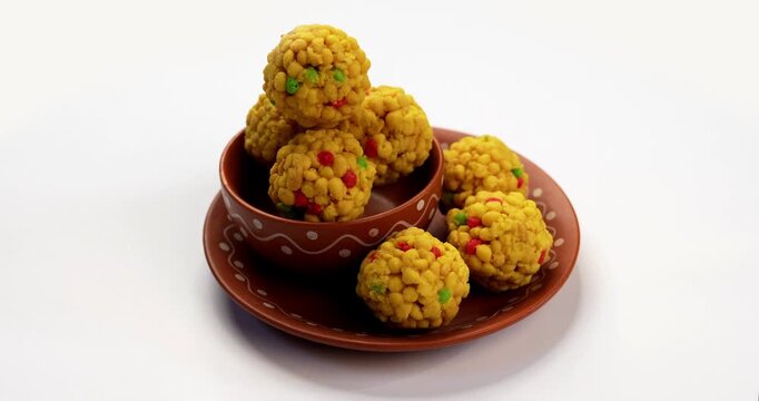 indian sweet motichoor laddoo&nbsp;or Bundi laddu made of gram flour very small balls or boondis which are deep fried and soaked in sugar syrup before making balls