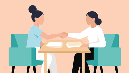 Business agreement: two professional women shaking hands at a table