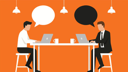 Two businessmen communicating and collaborating on laptops at a table