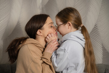 Tender moment shared between mother and daughter