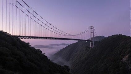 Fototapeta premium Majestic Suspension Bridge Spanning Verdant Mountains at Dusk.