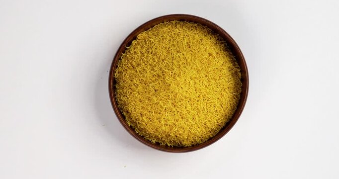 Besan Sev or Indian Namkeen Noodles of chickpea flour. Popular Gujarati&nbsp;Deep fried Teatime Snack.