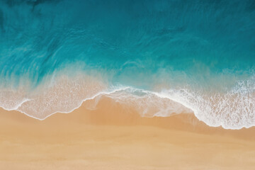 Close-Up Aerial View of Ocean Waves Reaching Sandy Beach