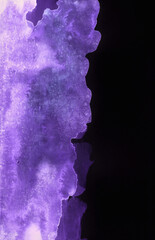 Bright painted neon blue and violet watercolor texture. Hand drawn background.